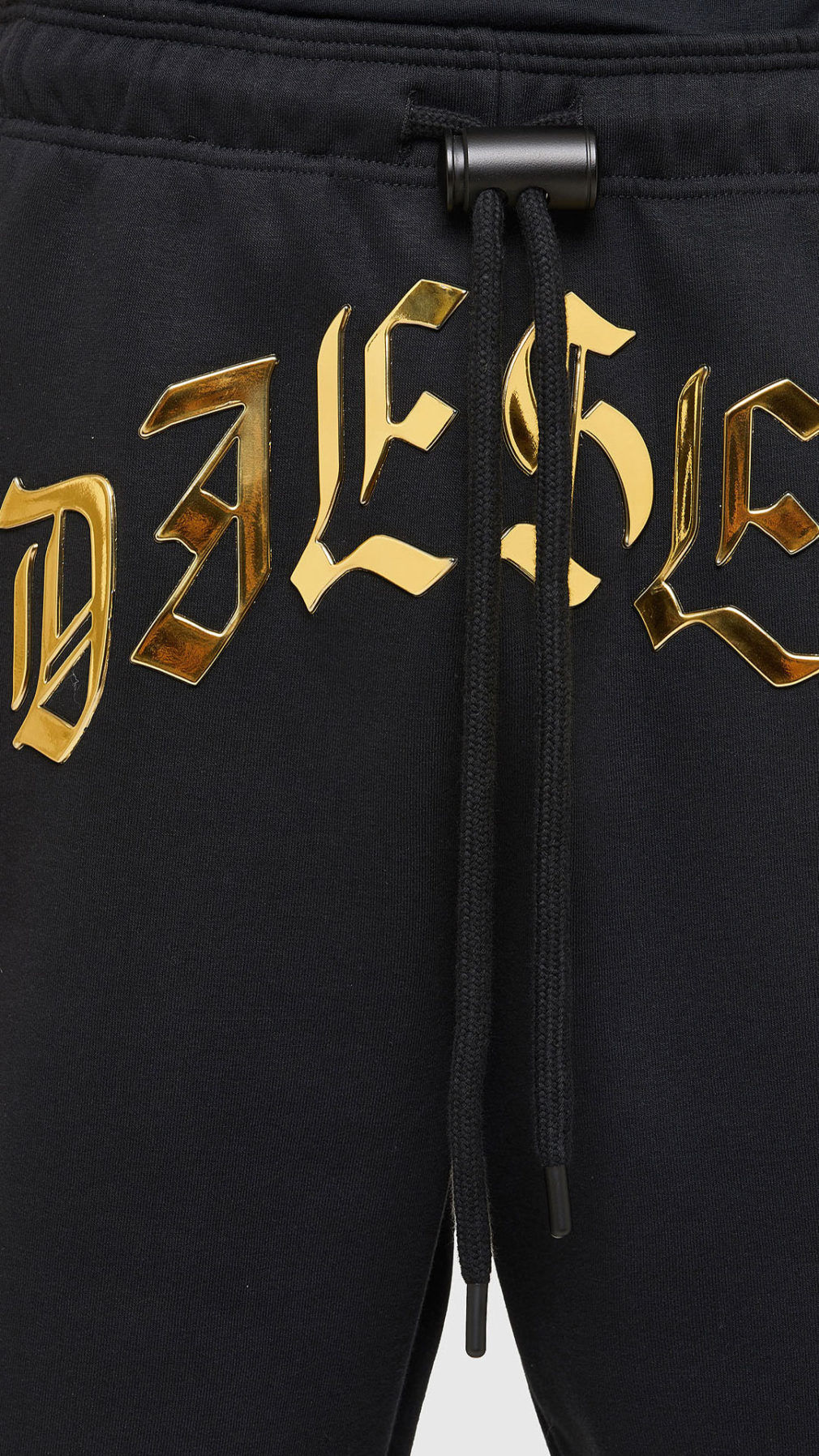 Jogging diesel con logo en relieve dorado