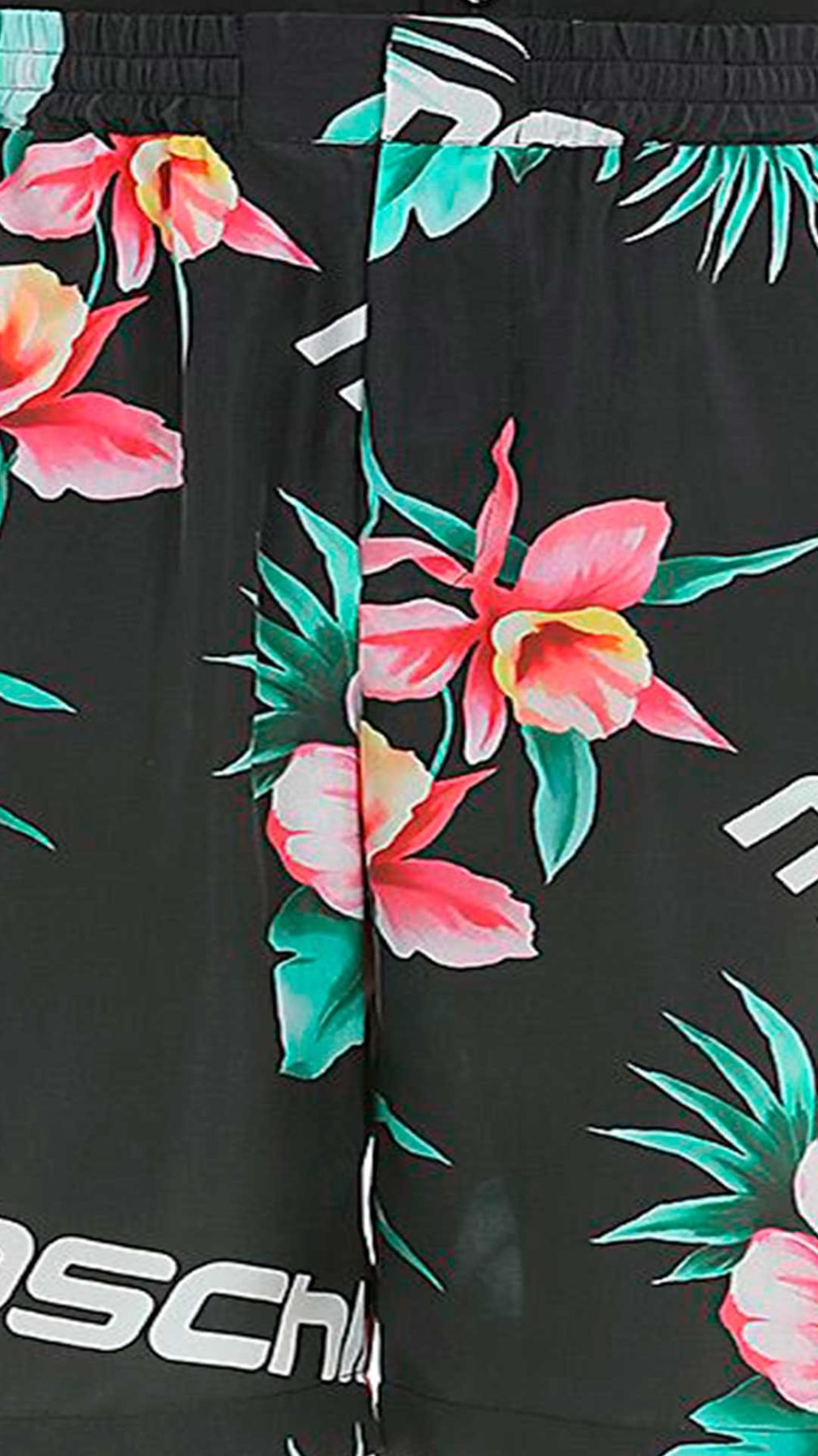 Pantalón corto Moschino estampado en todo el tejido con logotipo