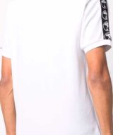 Polo blanco Moschino con logo Double Question Mark en la parte delantera y bandas laterales en las mangas
