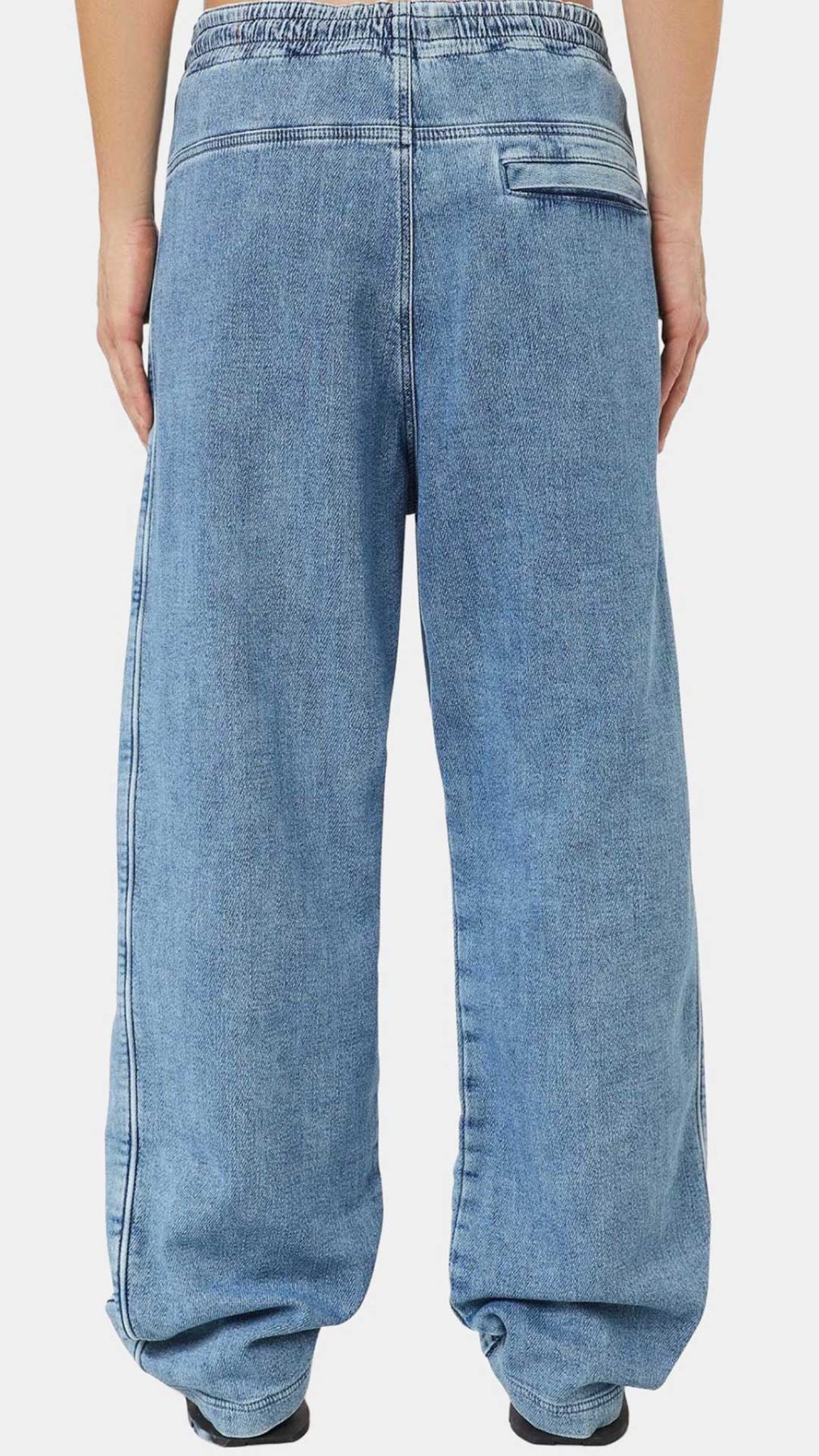 Pantalón azul Diesel D-Martians Track Denim Joggjeans con logotipo D en la parte delantera