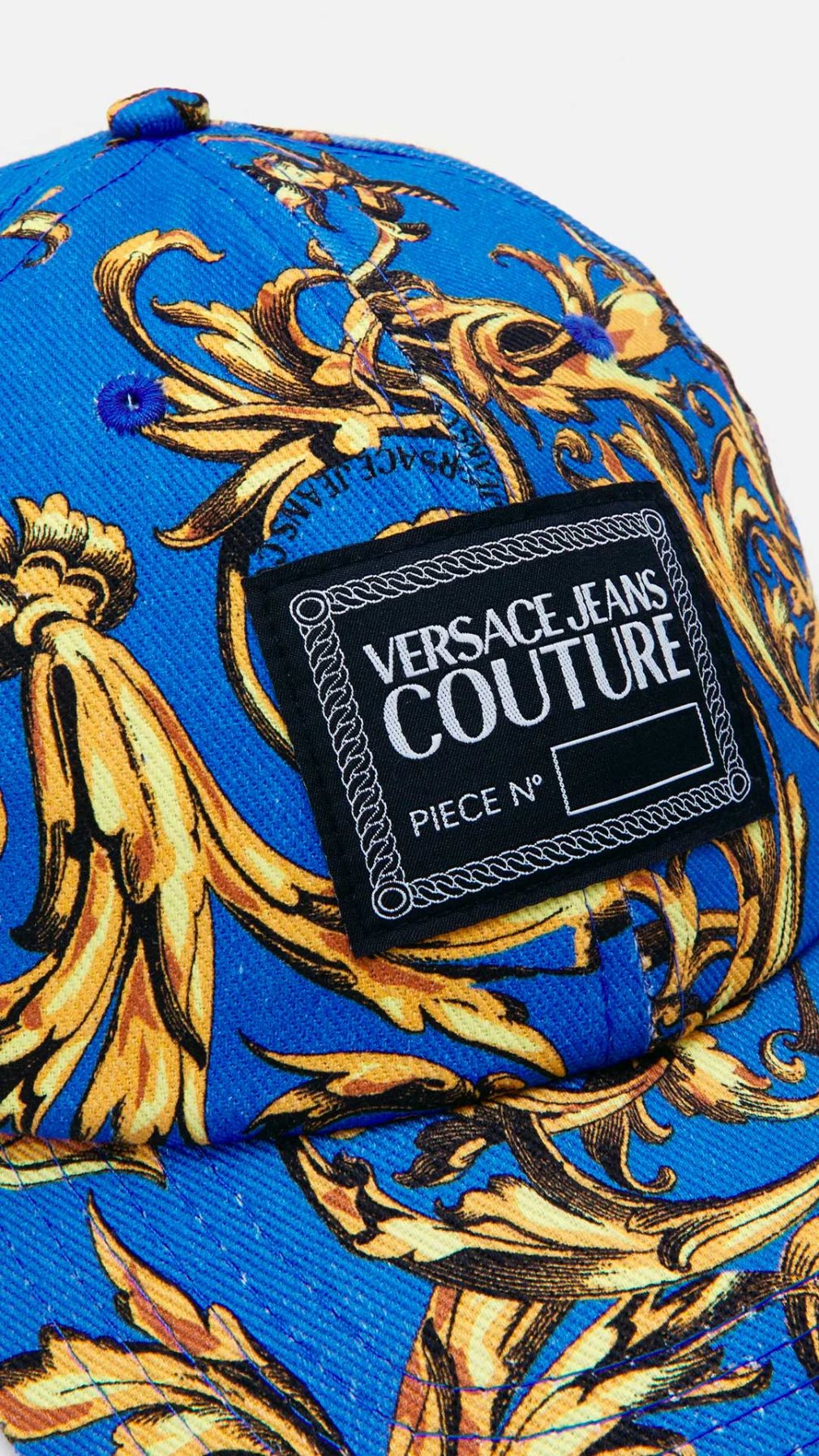 Gorra Versace Jeans Couture con estampado barroco
