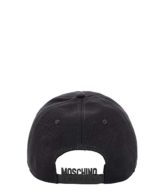 Gorra Moschino Double Question Mark en relieve dorado