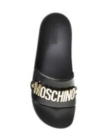 Chancla Moschino con placa del logotipo en tono dorado