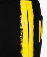 Pantalón corto Moschino bandas laterales con efecto pintado a mano.
