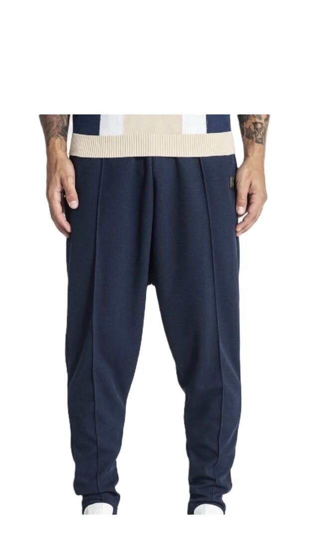 Pantalón amplio baggy de piqué con placa del logotipo