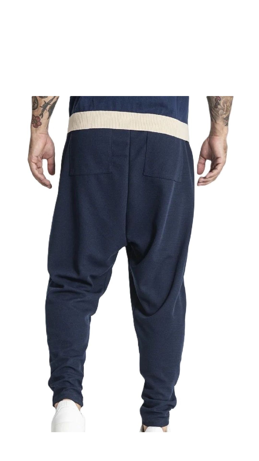 Pantalón amplio baggy de piqué con placa del logotipo