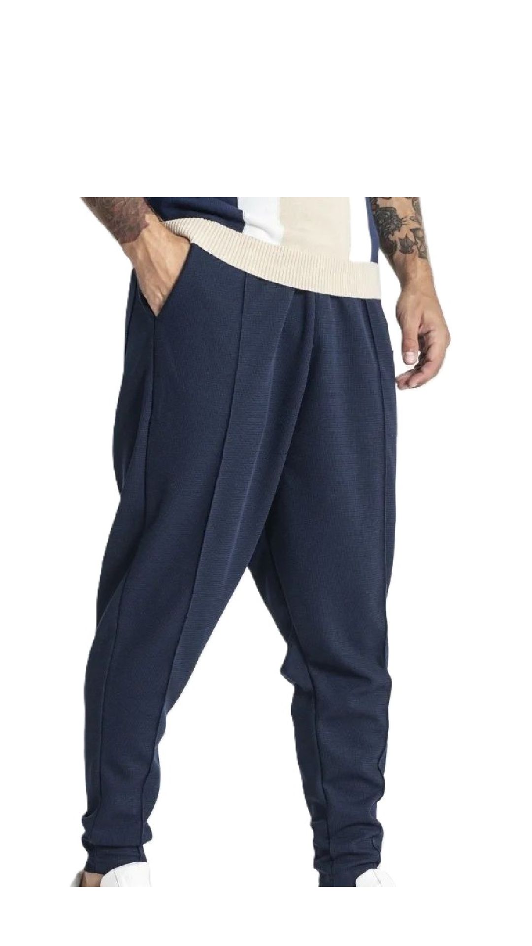 Pantalón amplio baggy de piqué con placa del logotipo